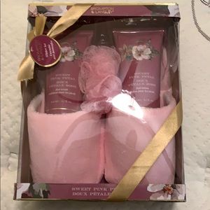 Pink slipper set with foot scrub and foot lotion